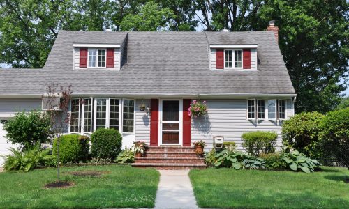 Grey Siding & Red Shutters