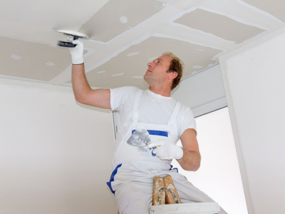 Worker Painting Ceiling