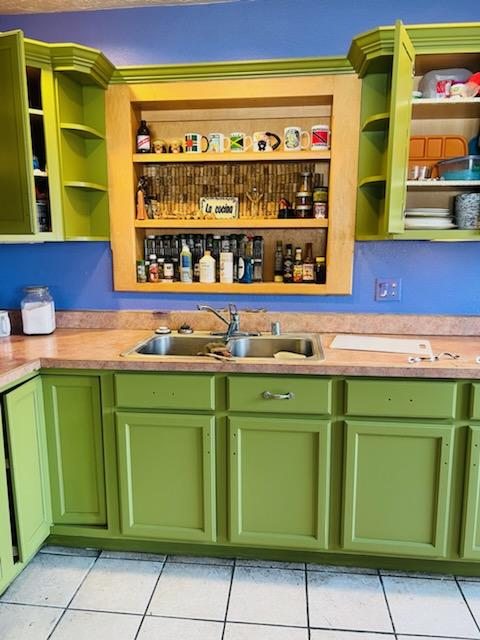 freshly painted green kitchen cabinets