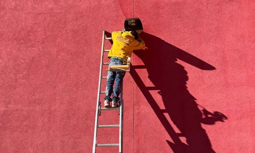 Painter On Ladder (During)