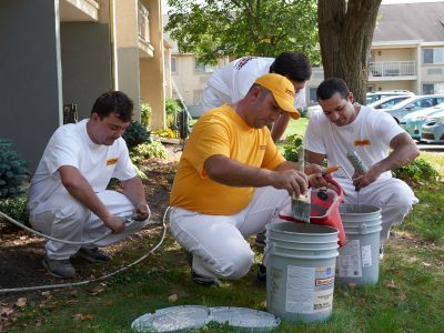 painters mixing paint