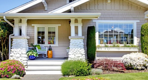 house with flowers on walkway
