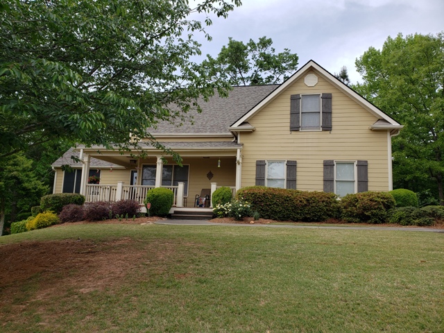 photo of home in alpharetta before being repainted