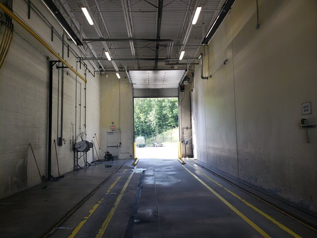 photo of 18 wheeler truck bay before new coating