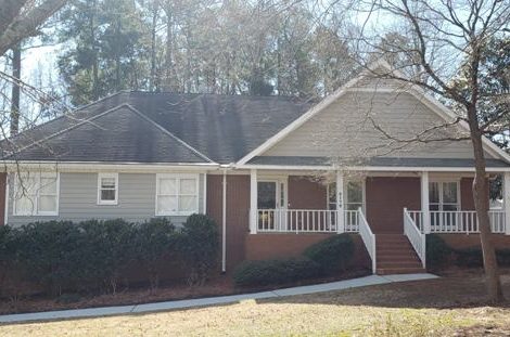 photo of brick home in alpharetta before being repainted