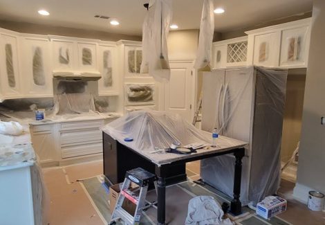 in progress photo of repainted kitchen cabinets