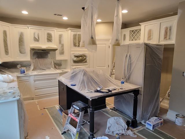 in progress photo of repainted kitchen cabinets Preview Image 1