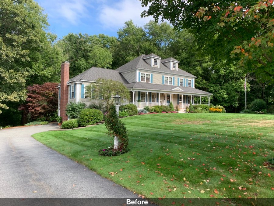 Home exterior before restoration from driveway Preview Image 1