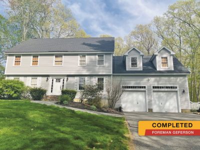 light grey painted house with white doors