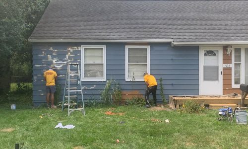 Aluminum Siding Being Painted