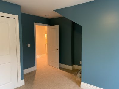 Two bedrooms painted with an accent wall.