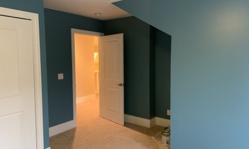 Two bedrooms painted with an accent wall.