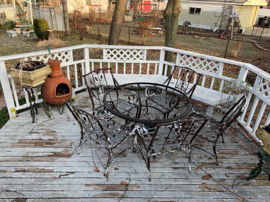 outside deck with heavily weathered paint. Preview Image 1