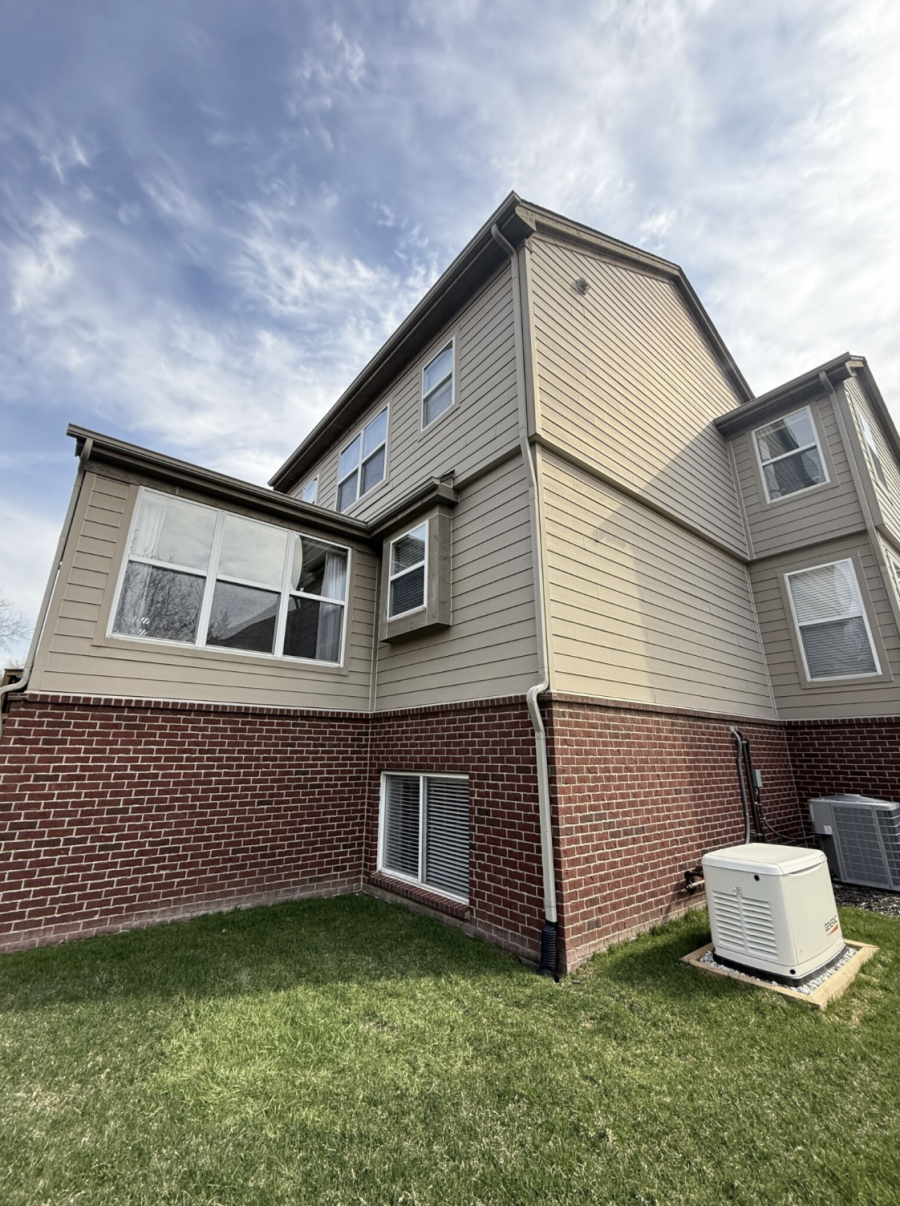 side of house with beige siding before repaint Preview Image 7