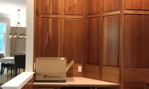 A built in desk and paneling