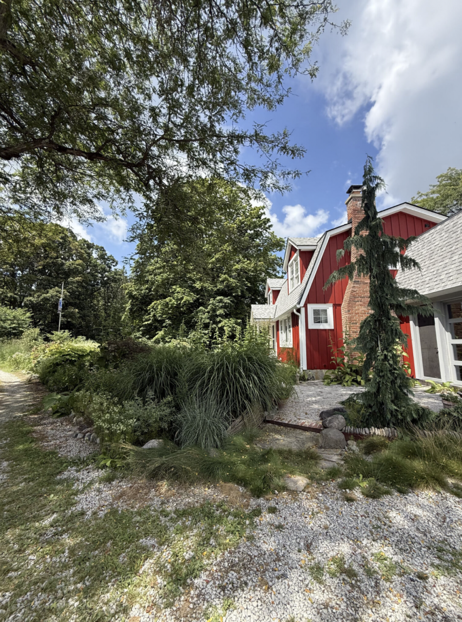 house with red stained wood siding and white trim Preview Image 3