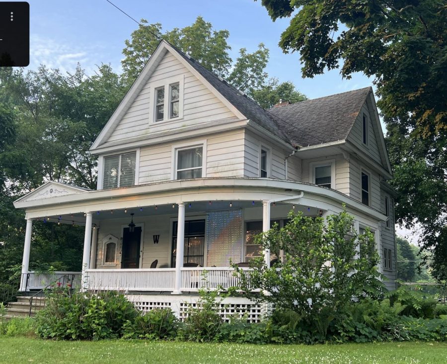 farmhouse exterior with aging white paint Preview Image 1