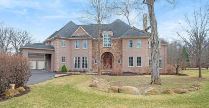 Stucco house repaired and painted.