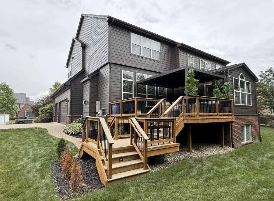 rear of house with brick and dark grey painted siding Preview Image 3