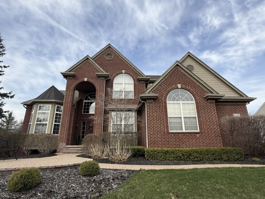 front of house with brick and beige siding Preview Image 8
