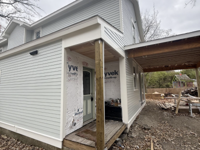house with light grey painted siding