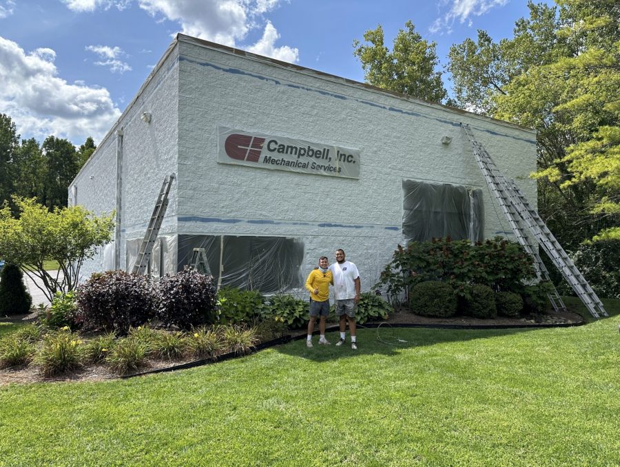 painters outside of commercial building during repaint Preview Image 4