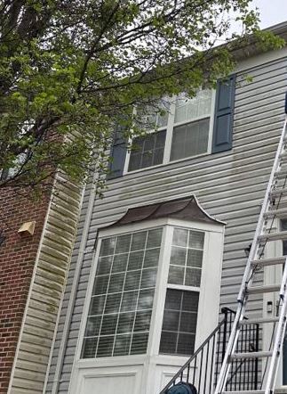 House siding before pressure washing by CertaPro Painters of Annapolis