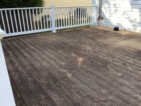 Deck before pressure washing by CertaPro Painters of Annapolis - Angle 2