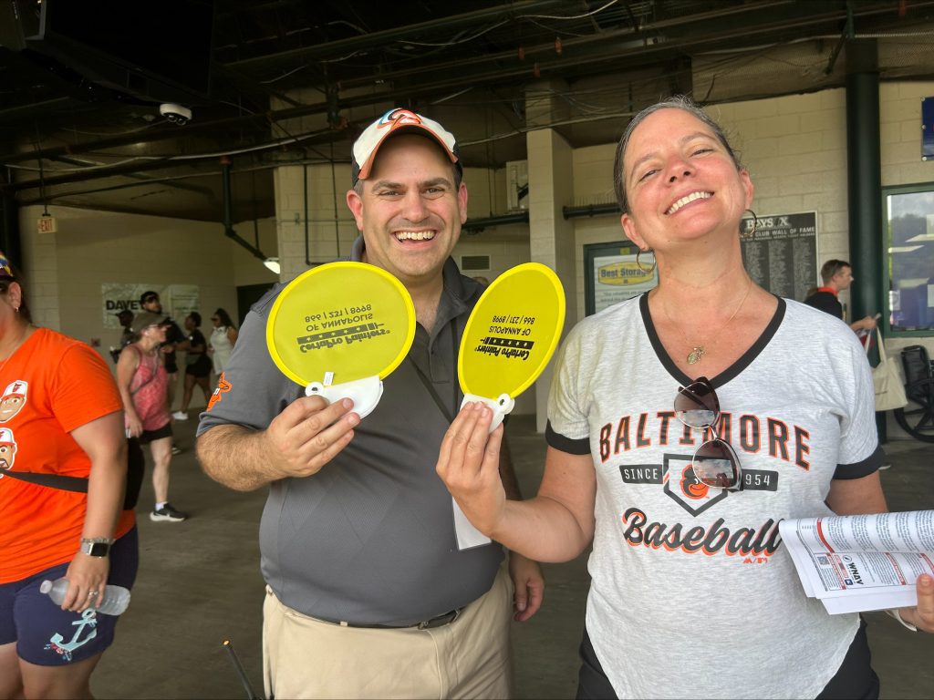 Baysox fans with certapro hand fan