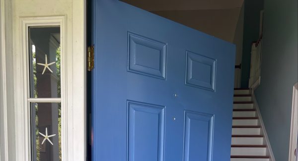 outdoor front view - newly painted open blue door after photos exterior painting project by certapro painters of annapolis