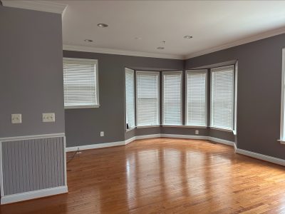 Residential interior room with gray walls after completed painting project by certapro painters of annapolis