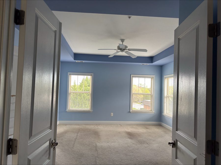 Residential interior room with blue walls after completed painting project by certapro painters of annapolis Preview Image 1