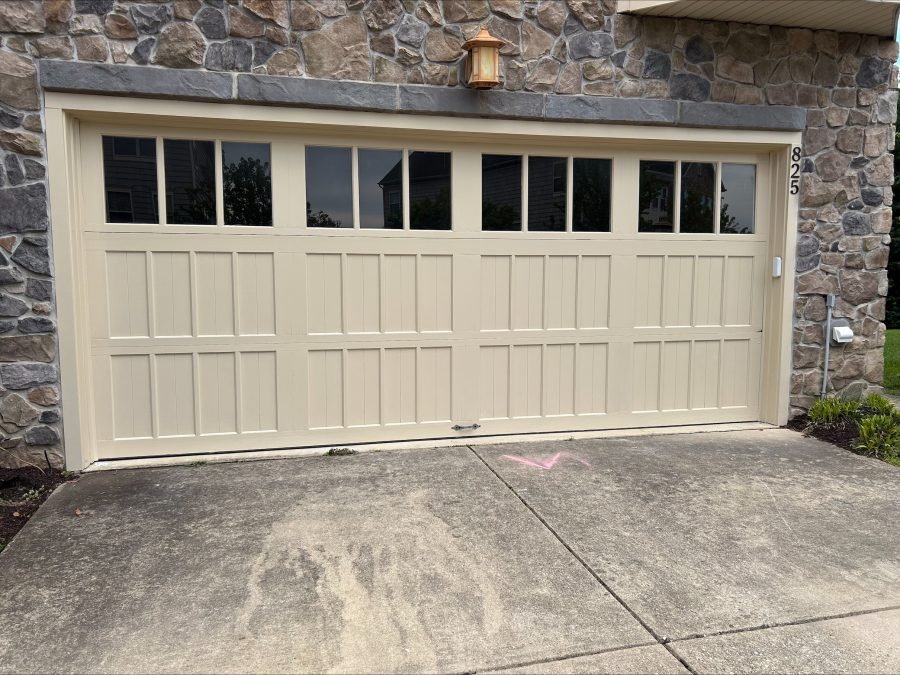 Cream color garage door after completed residential painting project by certapro painters of annapolis Preview Image 4