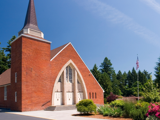 brick church with white doors