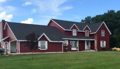 Red Exterior and White Siding in Anoka, MN
