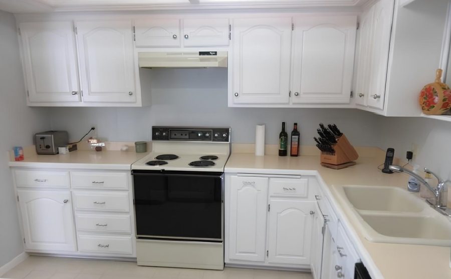 Brown Cabinets Repainted Modern White for Anoka Home