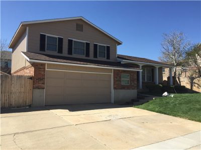 Exterior house painting by CertaPro painters in Wheat Ridge, CO