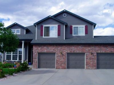 Exterior painting by CertaPro house painters in Edgewater, CO