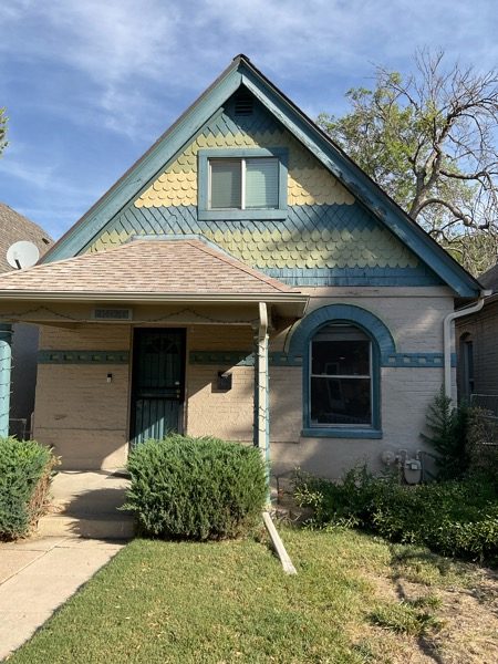 hosue with green and yellow siding Preview Image 1