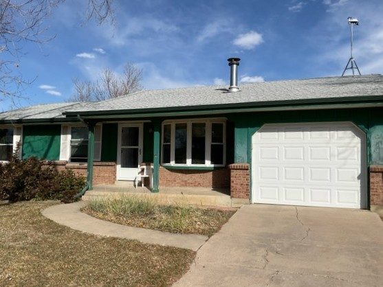 house exterior with green siding Preview Image 3