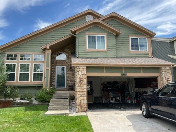 house with green siding before repiant Preview Image 1