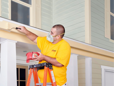 Exterior Painter painting house