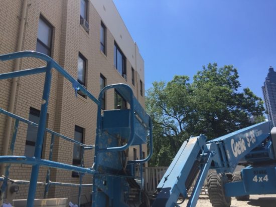 65' boom lift used for painting