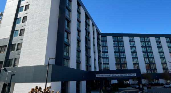 white and dark blue painted commercial building exterior