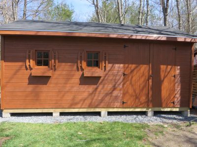Exterior Storage Shed painting and staining by CertaPro painters in Rehoboth