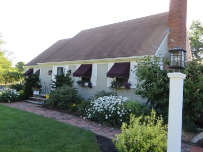 Exterior house painting by CertaPro painters in Swansea, MA