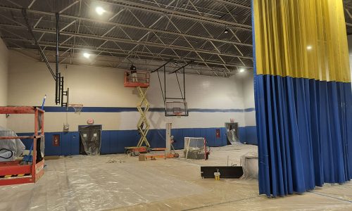 Painter Utilizing 30' Scissor Lift