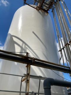 Water holding tank after rust removal and painting