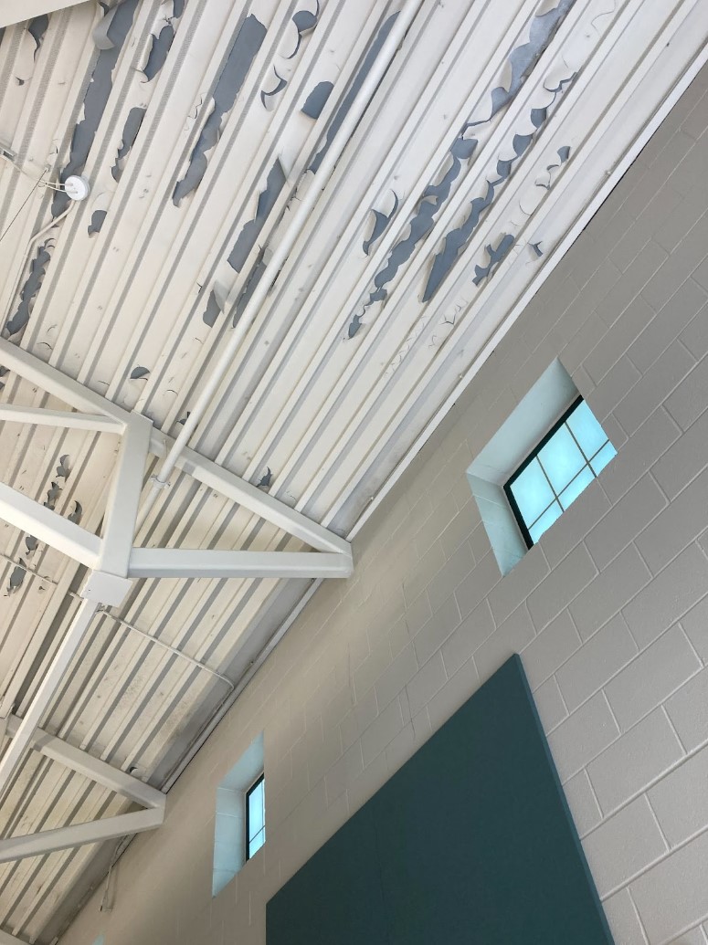 corrugated metal ceiling peeling paint
