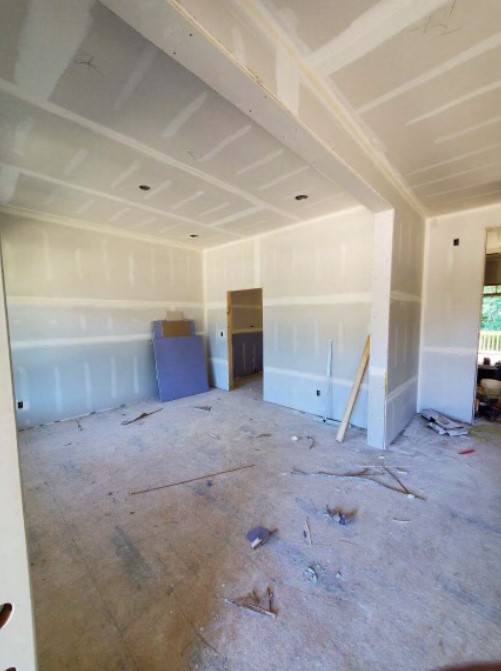 drywall installation at a construction site